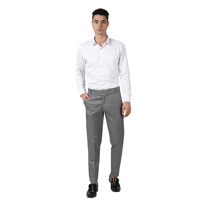 Male model in white formal shirt with grey formal trousers and black leather shoes - menswear ecommerce photography by Lohar Studio Delhi